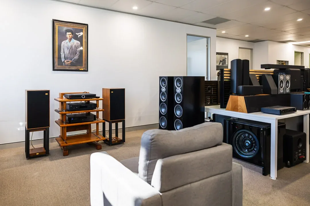 A listening area inside Audio Revival with vintage and modern speakers on display