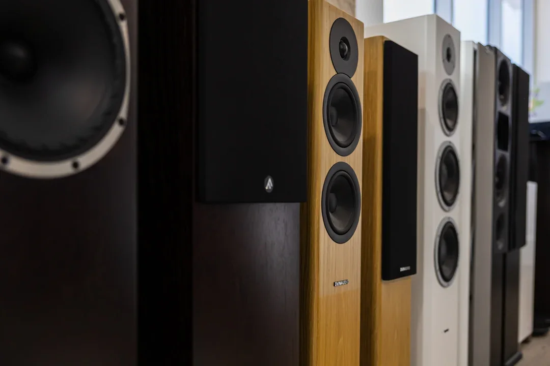 A close view along a row of timber and black loudspeakers in the Audio Revival showroom