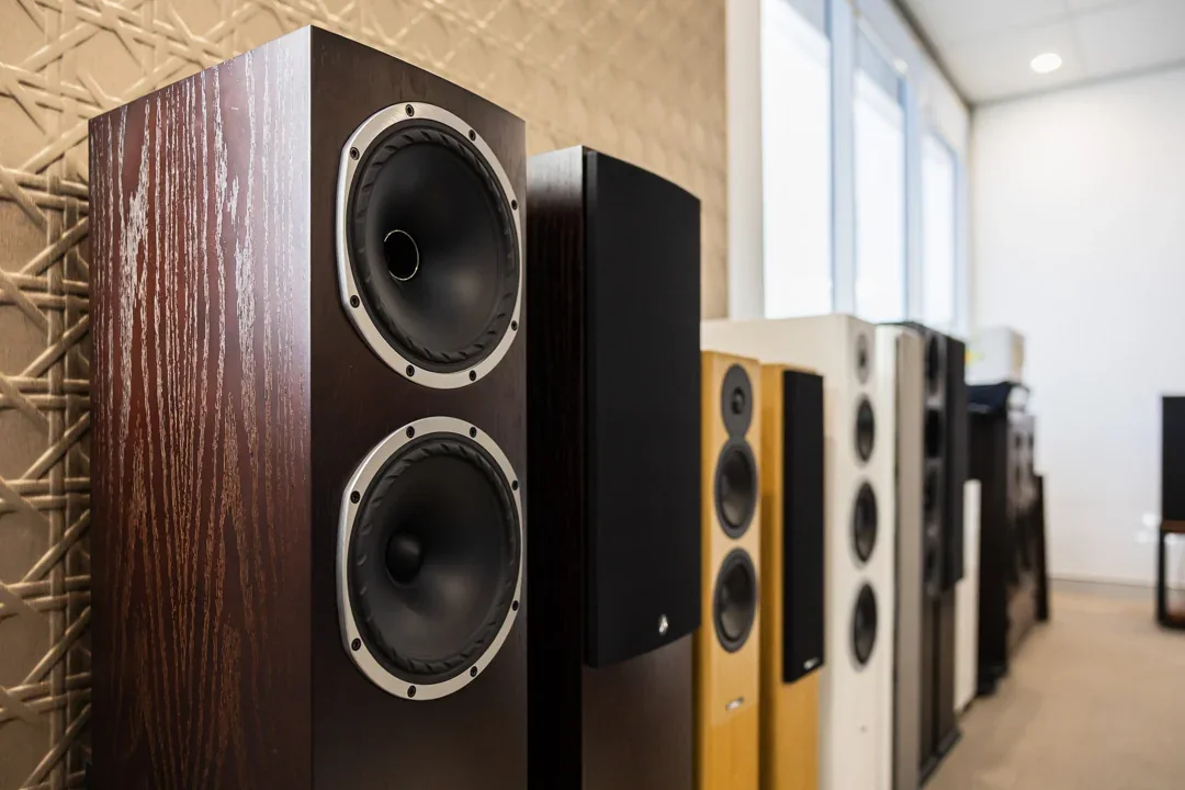 Close detail of a timber loudspeaker beside the Audio Revival speaker display