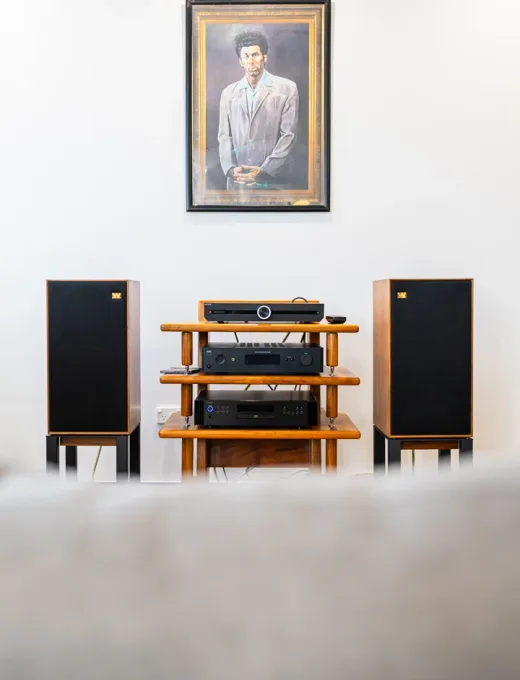 A portrait view of a vintage amplifier and speaker system in the Audio Revival showroom